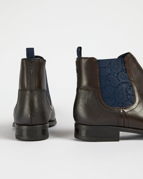 <P Class="Description">A Staple Pair For The Modern Gent, Our Tradd Boots Give Any Ensemble A Classic Upgrade. Crafted Fro...